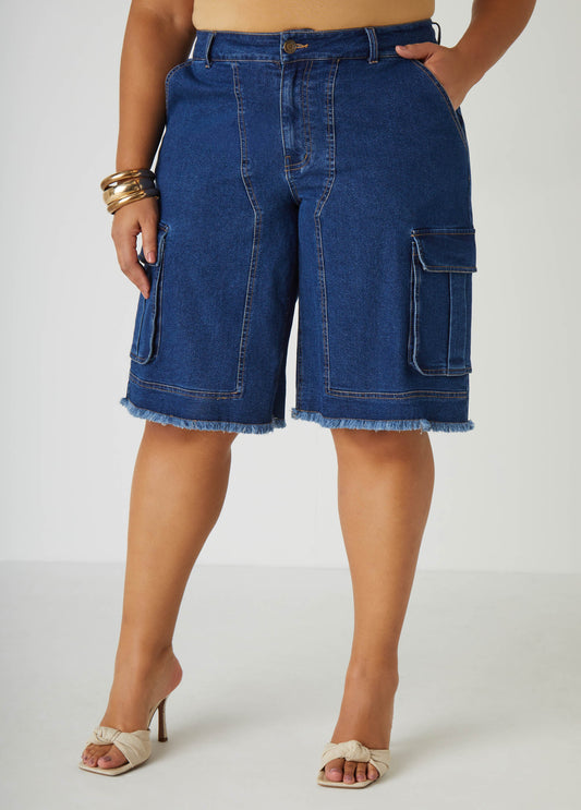 Mid-rise stretch-denim cargo Bermuda shorts with two cargo pockets at sides and frayed trims. Classic five pockets. Button and zip fastenings at front. Inseam: 13in.